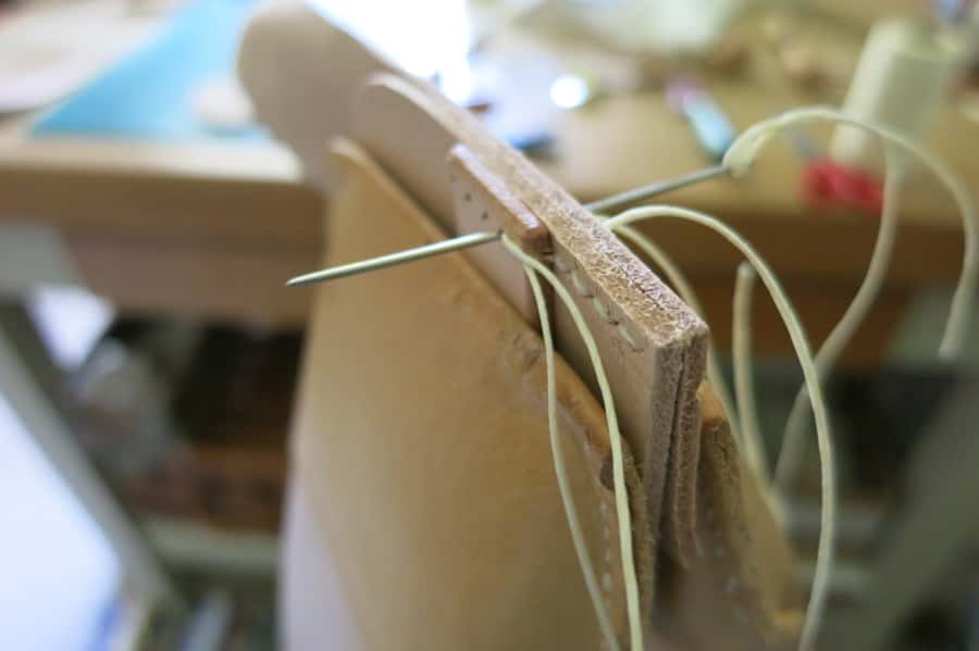 Stitching a leather purse