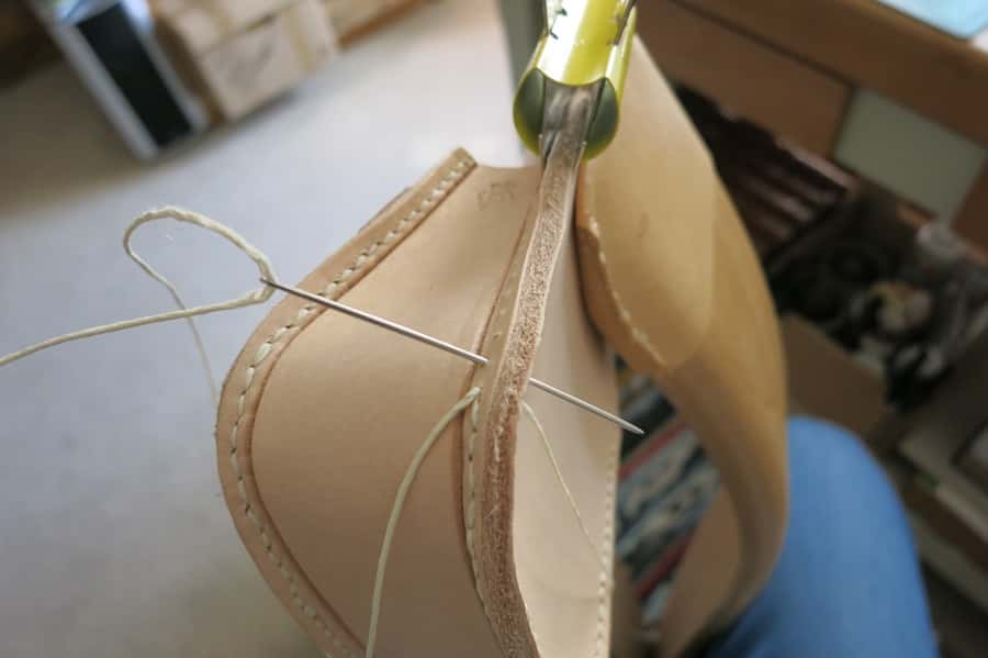 Stitching a leather purse