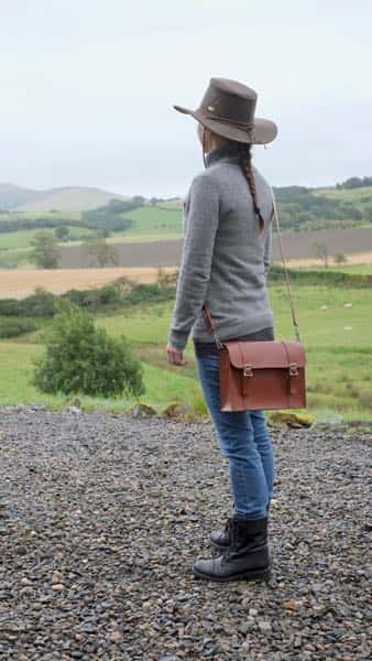 Leather A5 satchel shoulder bag being worn