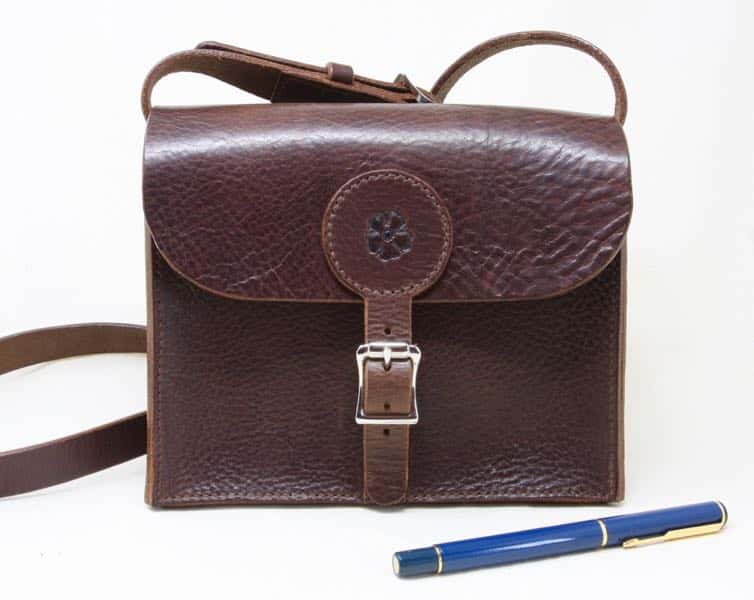 Dark brown medium leather shoulder bag with rose motif