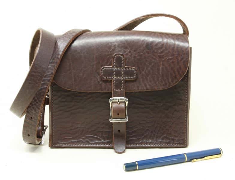 Dark brown medium leather shoulder bag with cross strap with pen show scale