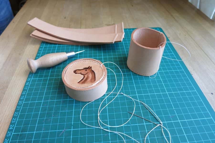 Small round leather box being made