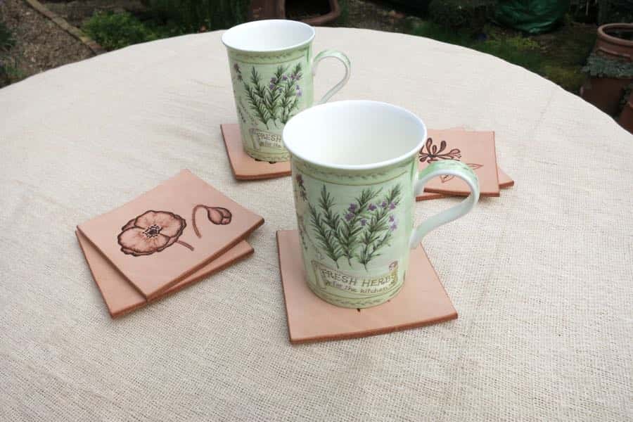 Set square leather drinks coasters in use