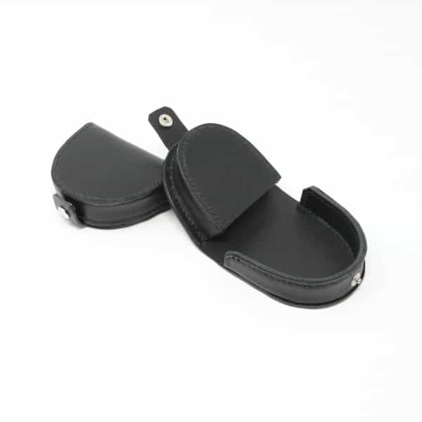 Black leather coin catcher purse shown open and closed