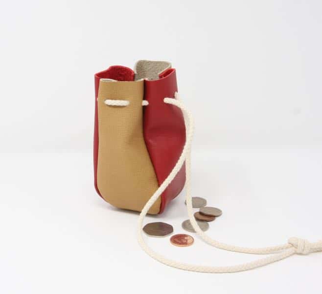 Red and tan leather drawstring pouch