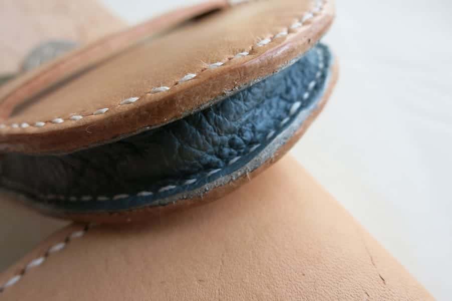 Small leather coin pouch showing gusset detail