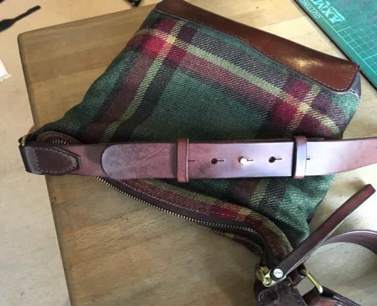 Replacement leather bag strap retaining original fastenings